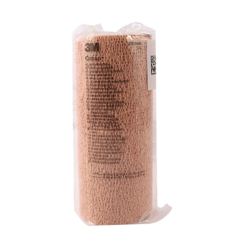 Front of Solventum 3M Coban Tan Self-Adherent Wrap, 15cm x 4.5m, 1586, in clear packaging